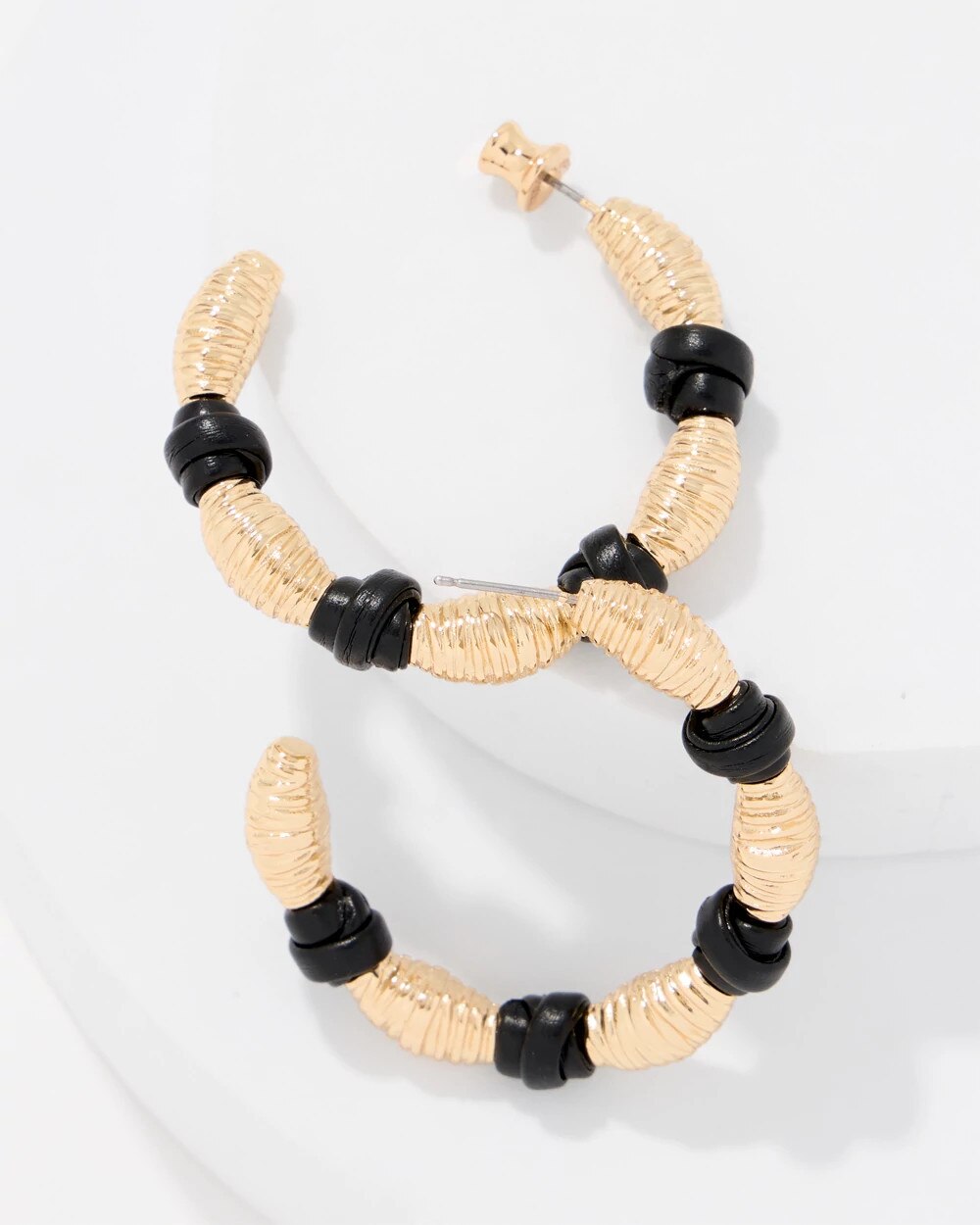 WHBM_ER20Gld20Sculpt20Knot20Hoop_570409893_TAN000932_TT_ALT202.jpeg