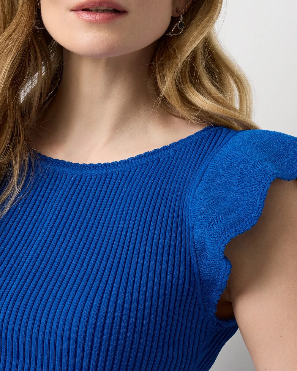 WHBM_Flutter20Slv20Peplum20PO_570410906_BLU007359_OF_ALT202.jpeg