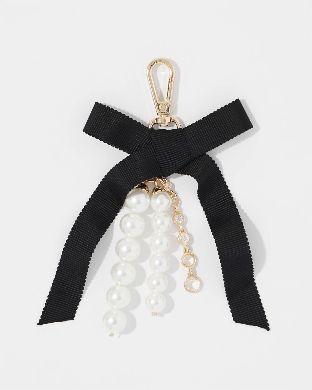 WHBM_Gld20Pearl20Bow20Bag20Charm_570407781_TAN000932_TT_MAIN.jpeg