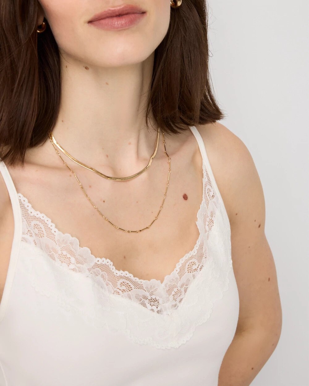 WHBM_WHBFORME20Sl20Lace20Vnk20Cami_570411359_IVO000190_OF_ALT202.jpeg